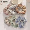 The new checkered trendy headwear features a woolen hair band that is retro and simple, a versatile fabric hair tie for girls, and a fat intestine hair tie Specification image